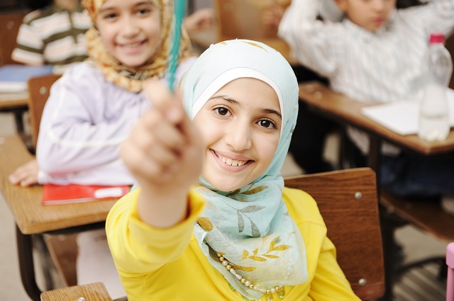 Adorable,Muslim,Girl,In,Classroom,With,Her,Friends,Children,Students